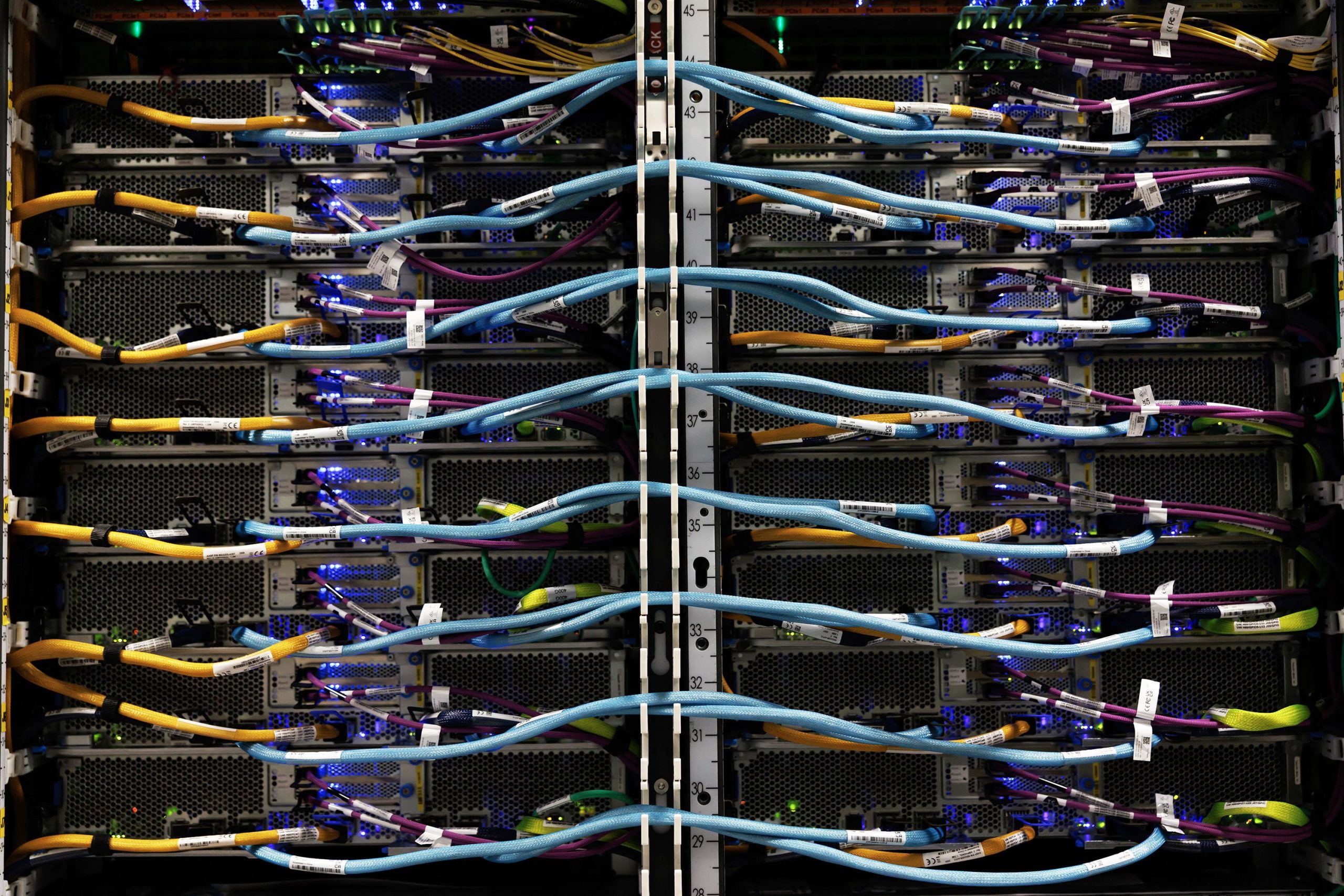 Wires are seen in a Trainium2 UltraServer at an Amazon Web Services QA lab in Austin, Texas, on February 3, 2026.
