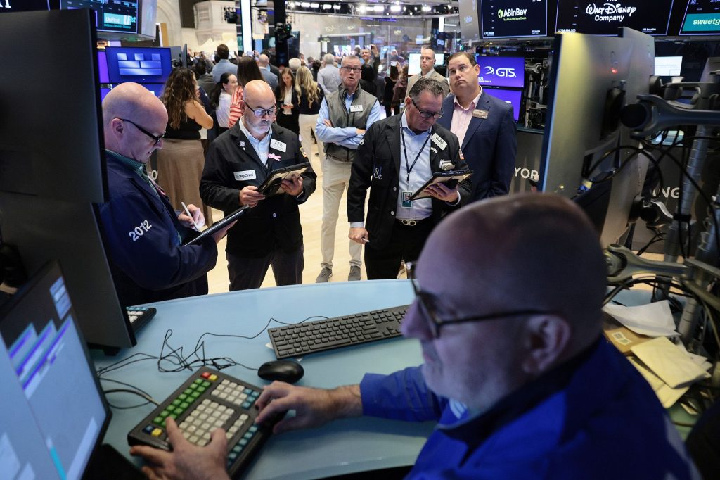 AI stocks drop after hot inflation report fuels bets for rate hikes